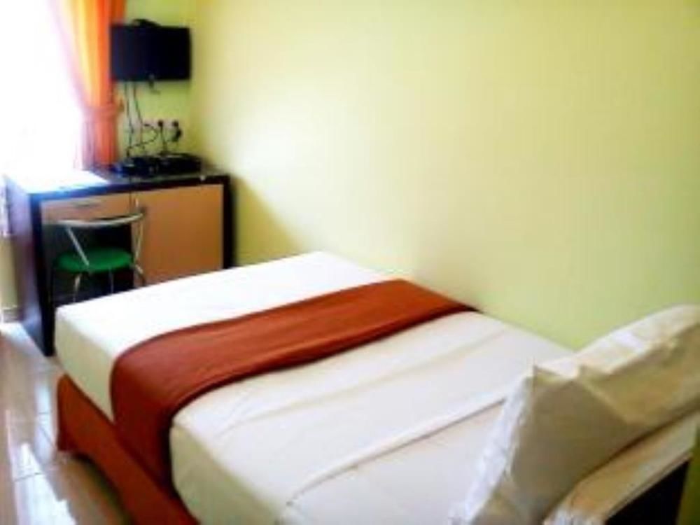 Hotel Keluarga Djagalan Raya สุราบายา ภายนอก รูปภาพ