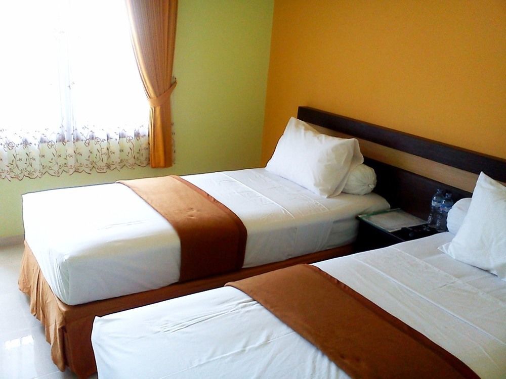 Hotel Keluarga Djagalan Raya สุราบายา ภายนอก รูปภาพ